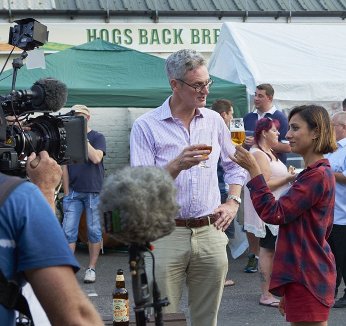 Rupert Thompson of Hogs Back Brewery explains to Countryfile presenter Anita Rani how hops add bitterness and aroma to beer.