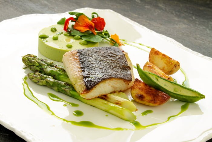 Chefs should keep sea bass for specials menus, despite an improvement in its sustainability rating, says Direct Seafoods.